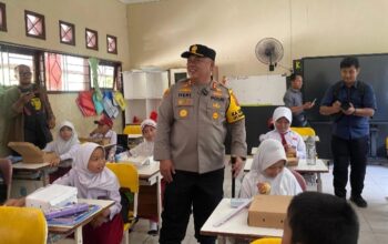540 Penerima Makanan Bergizi Dari Polres Kukar Di SDN 007 Tenggarong